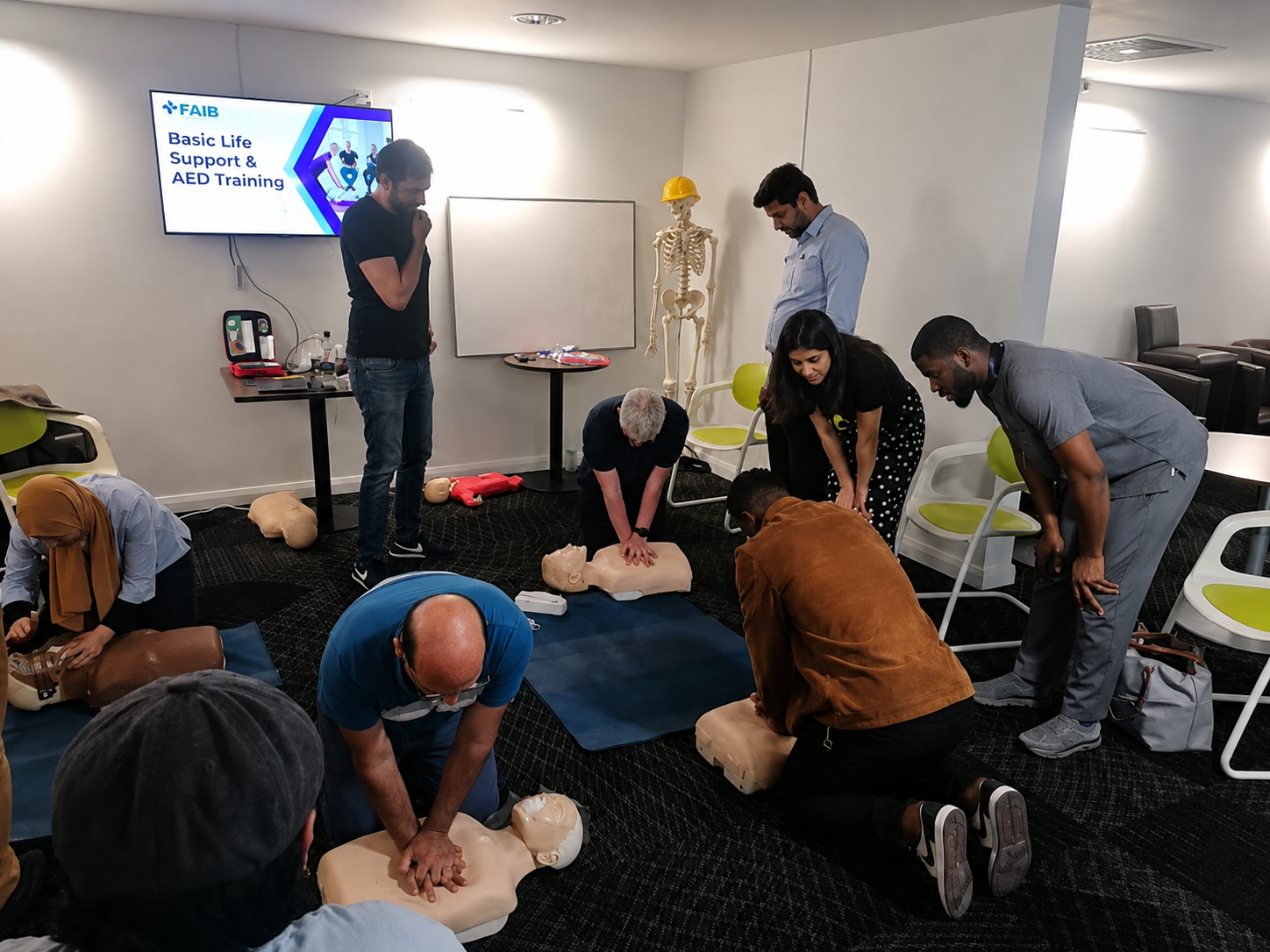 Delegates practising CPR during Basic Life Support training