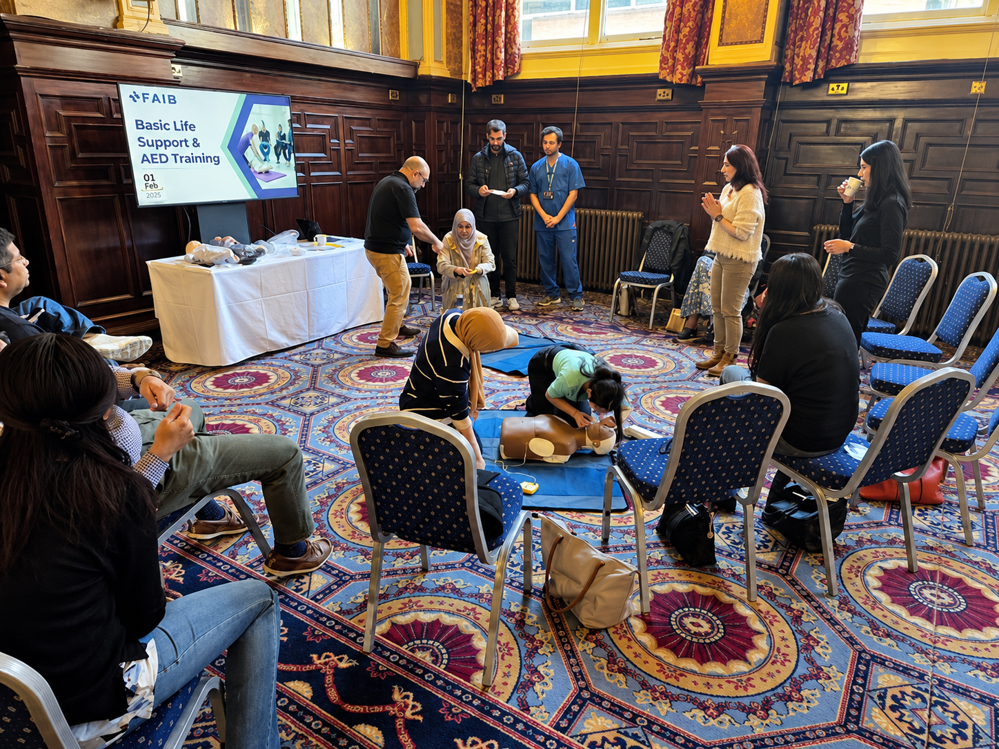 Healthcare professionals undertaking practical Basic Life Support training