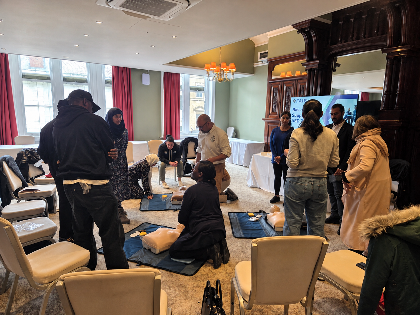 Healthcare professionals participating in Basic Life Support training