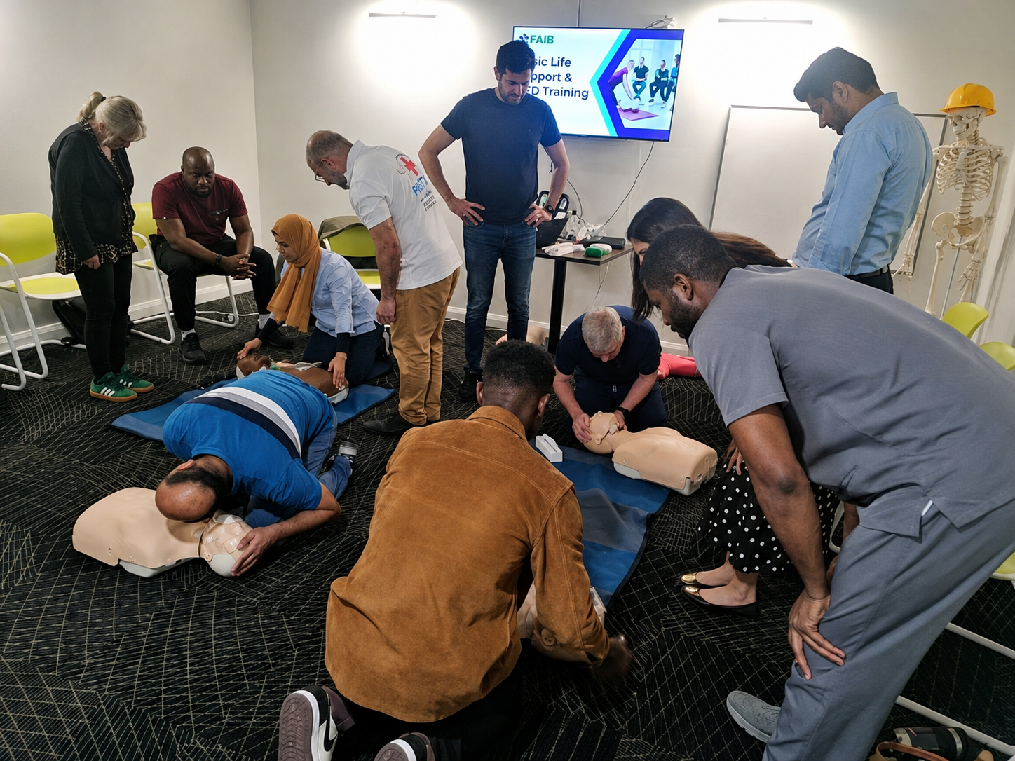 Delegates practising Basic Life Support skills